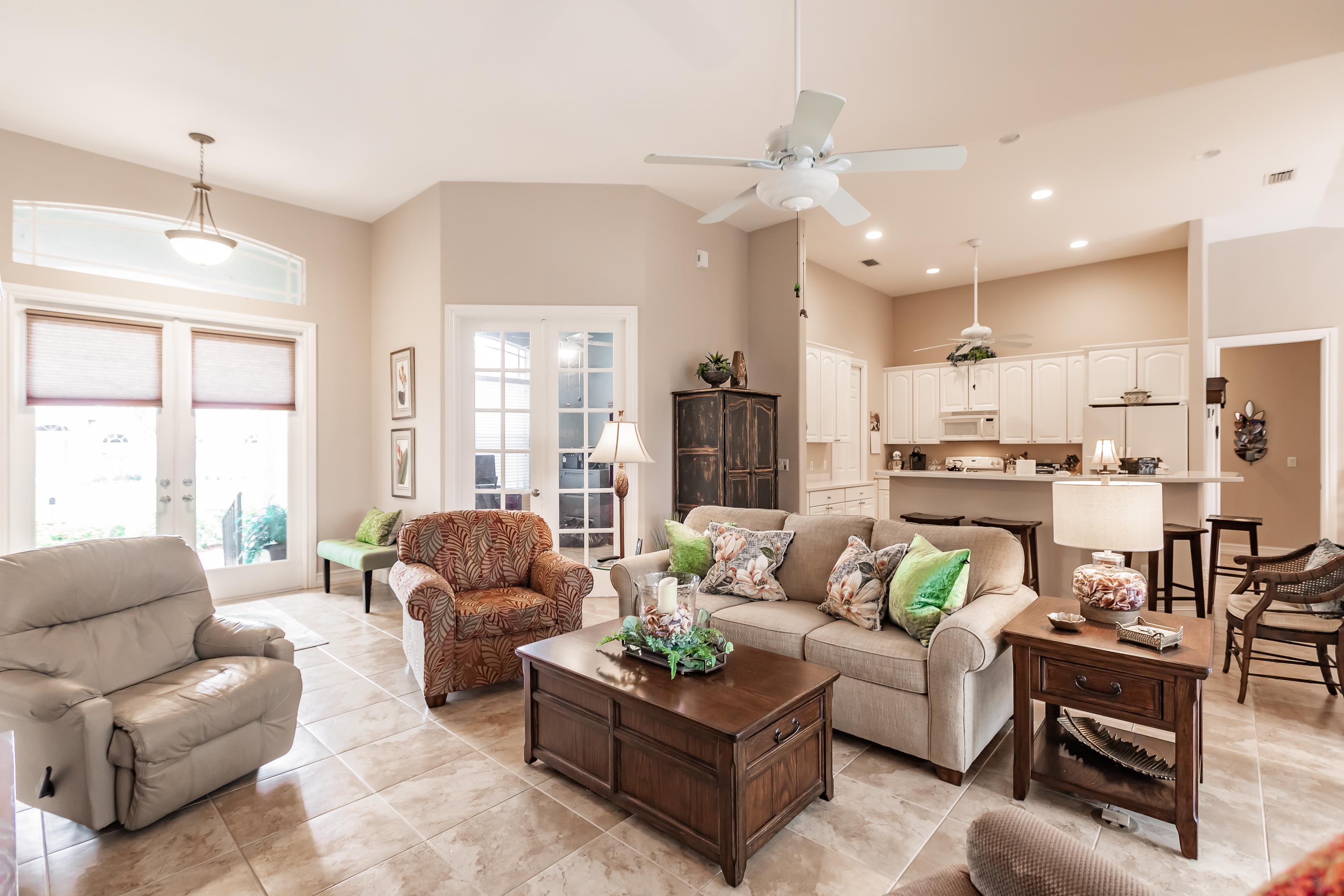 31 Tahiti Road Marco Island, FL 34145 - Photo 6 of 31 a living room with furniture kitchen and a large window