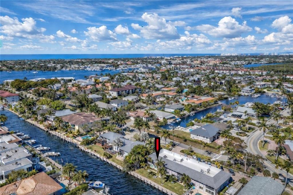 1686 Blue Point Avenue, Unit B5 Naples, FL 34102 - Photo 40 of 46 an aerial view of a city