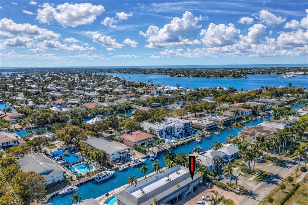 1686 Blue Point Avenue, Unit B5 Naples, FL 34102 - Photo 41 of 46 an aerial view of a city