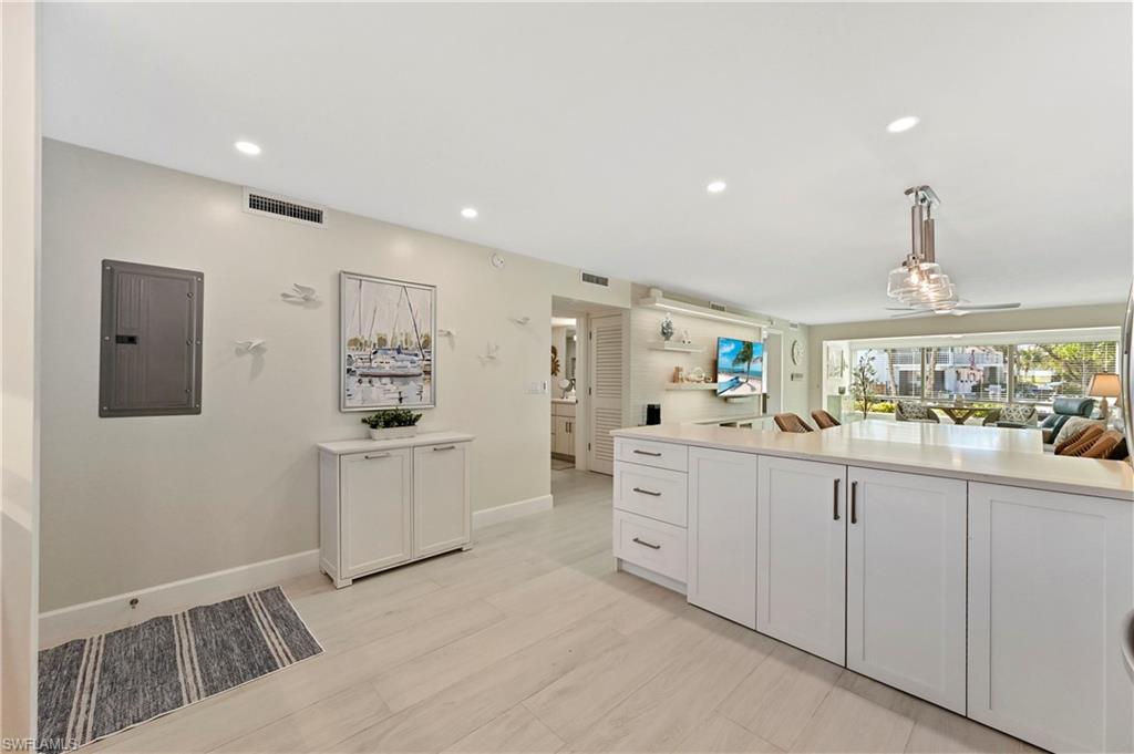 1686 Blue Point Avenue, Unit B5 Naples, FL 34102 - Photo 46 of 46 a kitchen with sink and cabinets