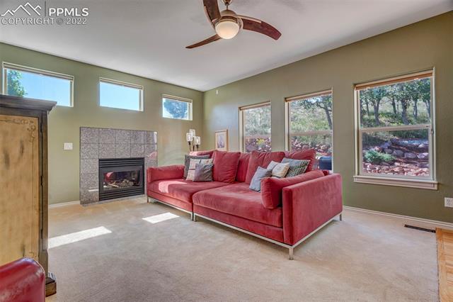 5480 Wilson Road Colorado Springs, CO 80919 - Photo 7 of 45 Main Level Family Room with Fireplace