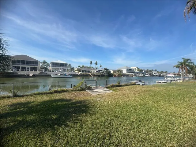 a view of a lake with building in front of it