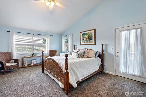 a bed room with a bed and a couch