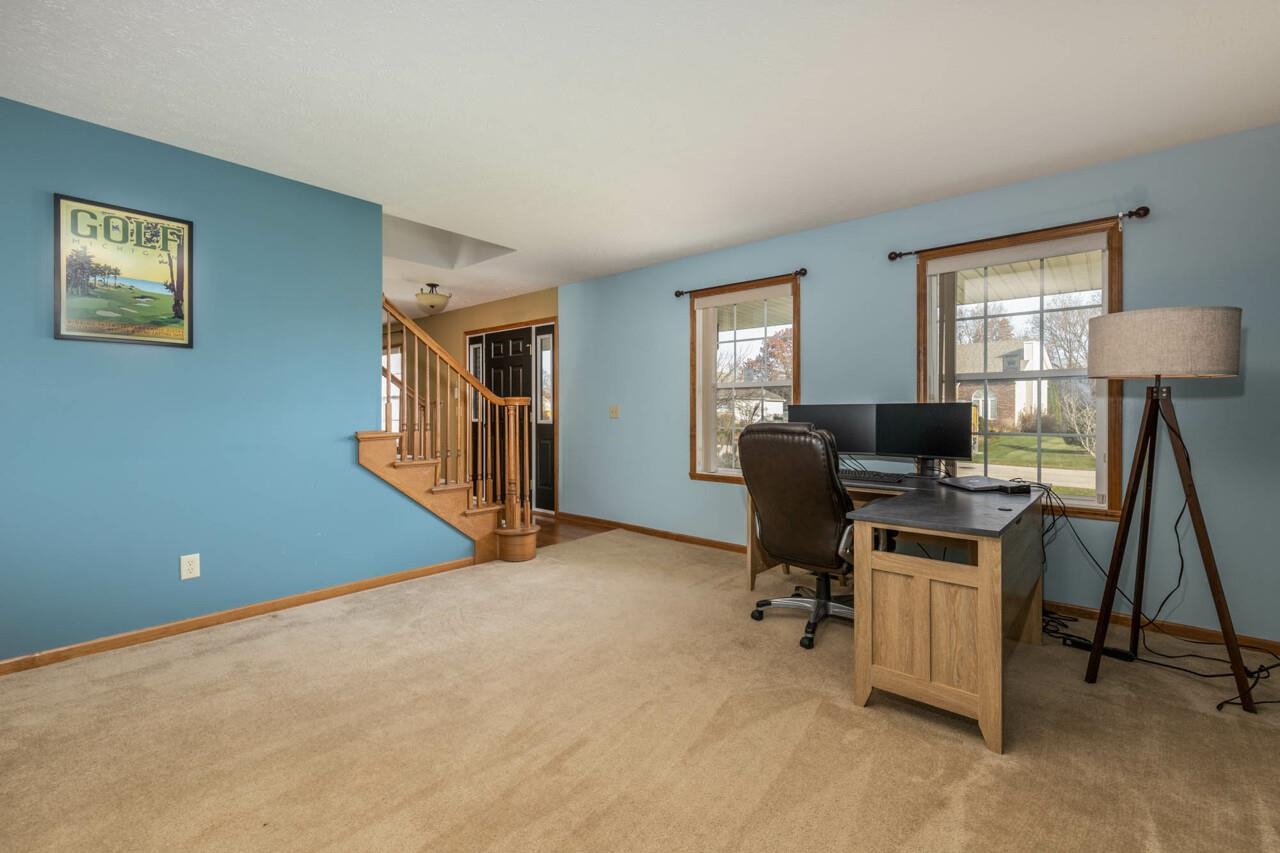 11102 Chicory Ridge Way Roscoe, IL 61073 - Photo 4 of 34 a view of a workspace with furniture and a window