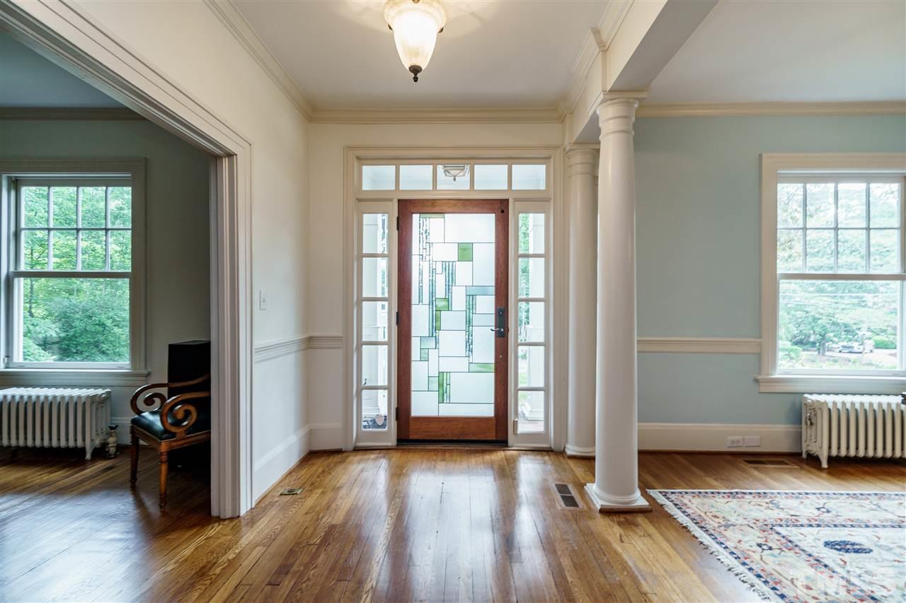 1631 St Marys Street Raleigh, NC 27608 - Photo 5 of 30 Classic symmetry defines the space as you enter. Formal Dining Room to the left. Formal Living Room to the right .