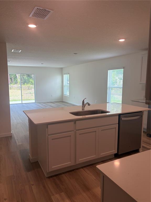 15886 Southeast 101st Ct Road Summerfield, FL 34491 - Photo 4 of 14 a kitchen with sink and window