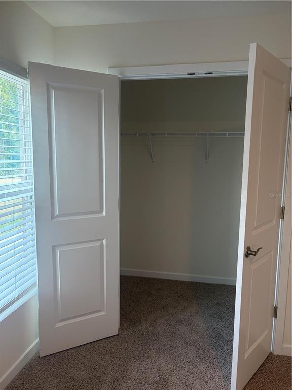 15886 Southeast 101st Ct Road Summerfield, FL 34491 - Photo 10 of 14 an empty room