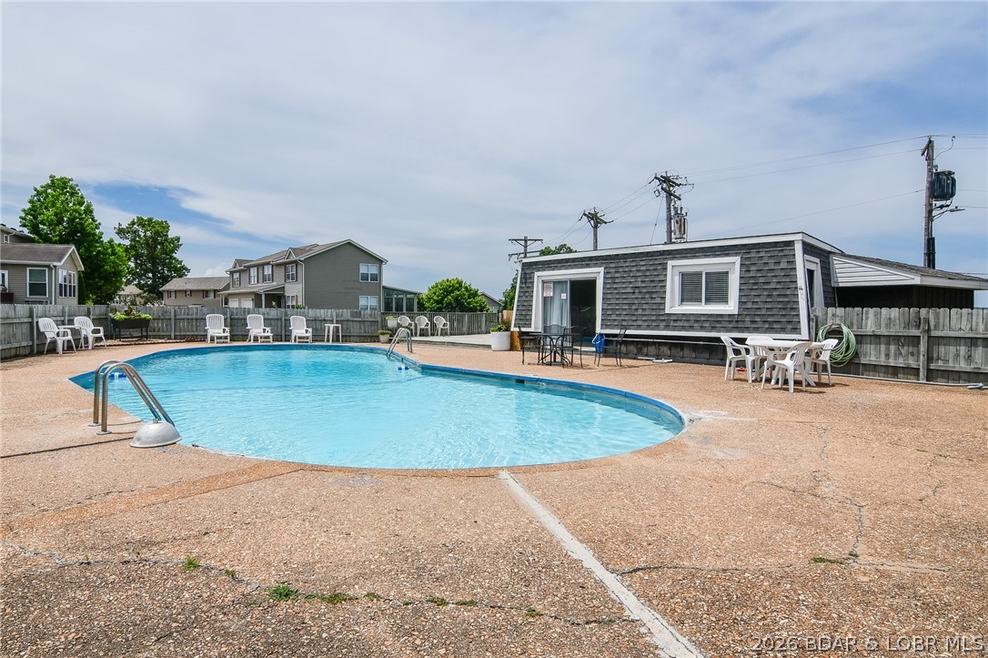 1118 Passover Road, Unit E216 Osage Beach, MO 65065 - Photo 22 of 31 Clubhouse off of community pool