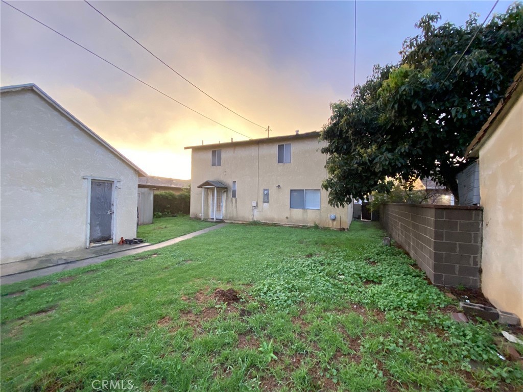 1190 South K Street Oxnard, CA 93033 - Photo 20 of 43 a view of a house with backyard