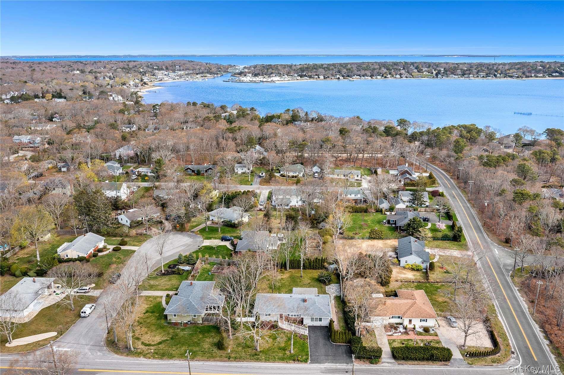 129 Lynncliff Road Hampton Bays, NY 11946 - Photo 18 of 19 an aerial view of a city
