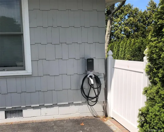 a bathroom with a shower and a window