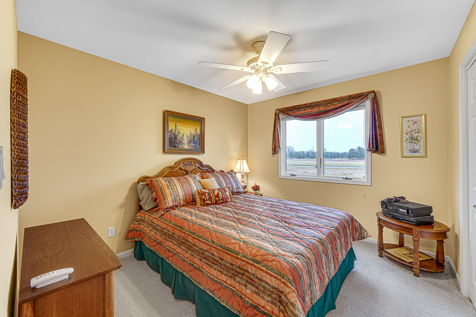 1718 Silver Hawk Drive Crown Point, IN 46307 - Photo 16 of 29 a bedroom with a bed and window