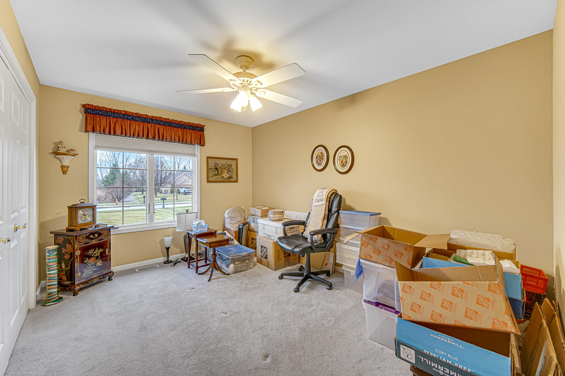1718 Silver Hawk Drive Crown Point, IN 46307 - Photo 17 of 29 a view of a workspace with furniture and a window
