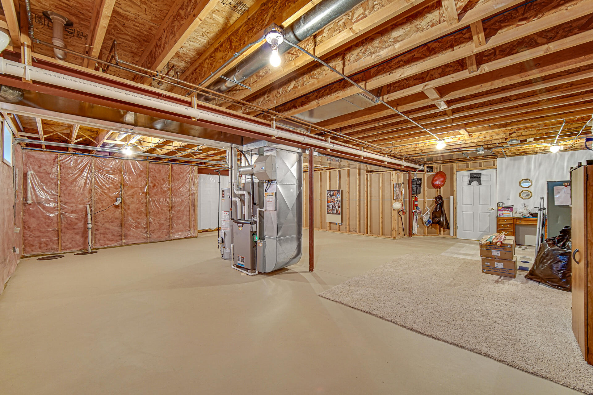 1718 Silver Hawk Drive Crown Point, IN 46307 - Photo 25 of 29 a view of storage and utility room with stairs