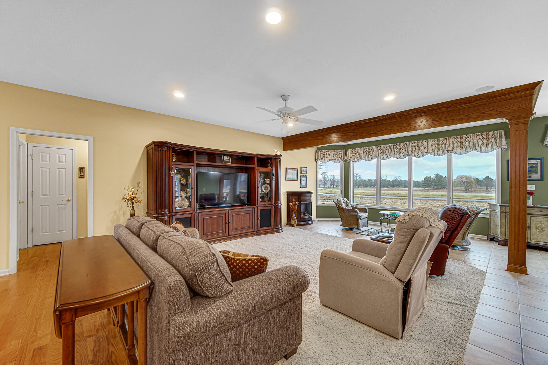 1718 Silver Hawk Drive Crown Point, IN 46307 - Photo 5 of 29 a living room with furniture and a large window