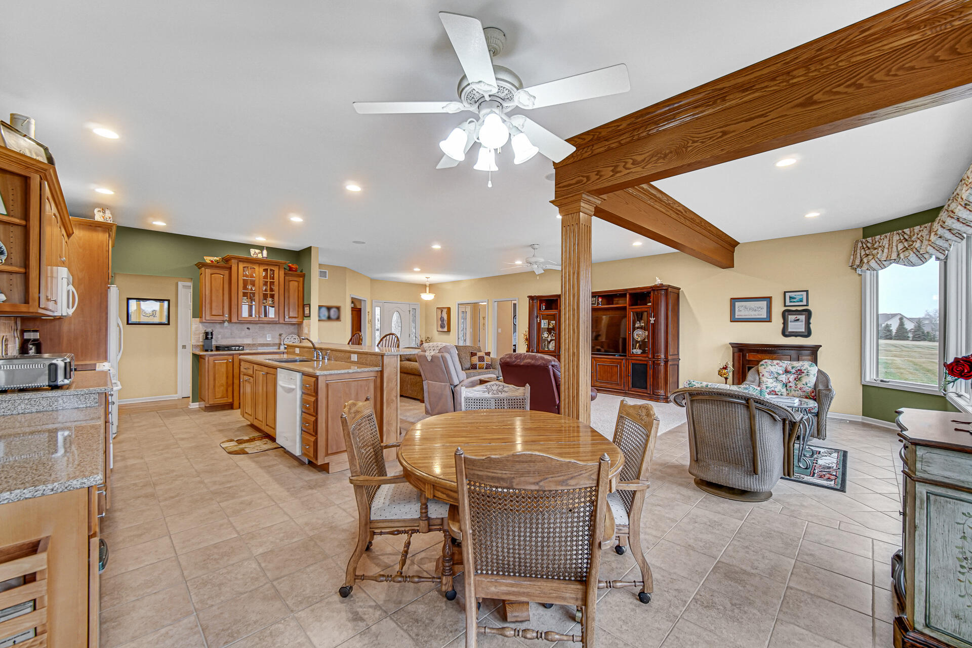 1718 Silver Hawk Drive Crown Point, IN 46307 - Photo 9 of 29 a view of a dining area with furniture