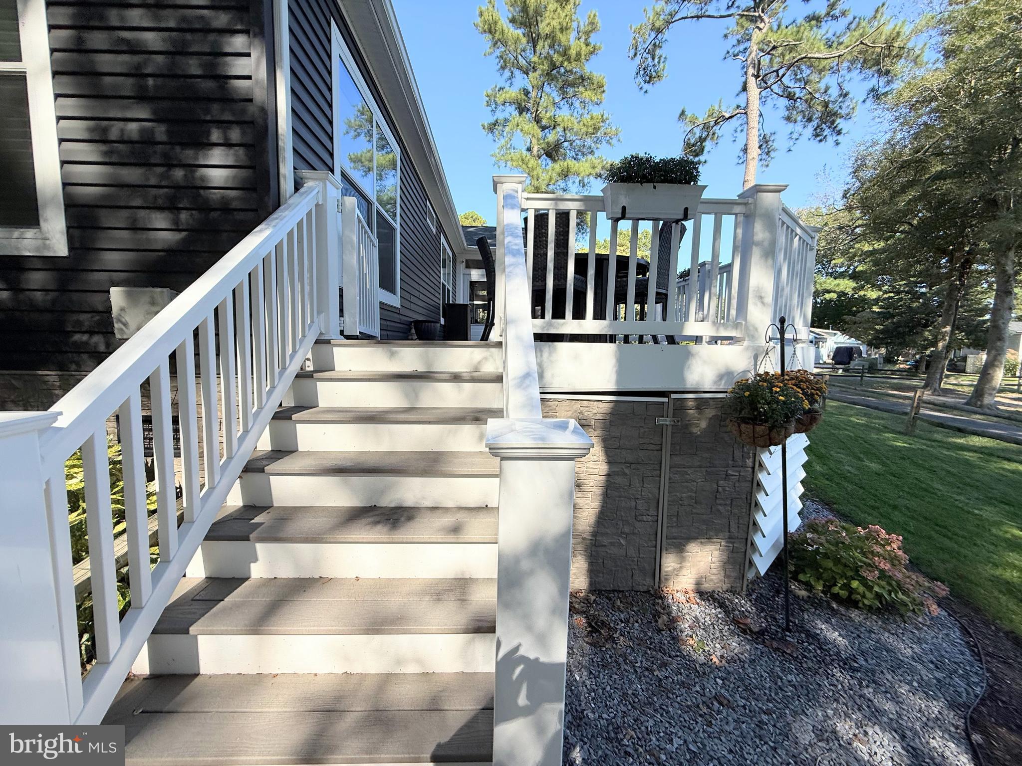 26908 Wood Duck Road, Unit 611 Long Neck, DE 19966 - Photo 11 of 80 a view of entryway and hall with wooden floor