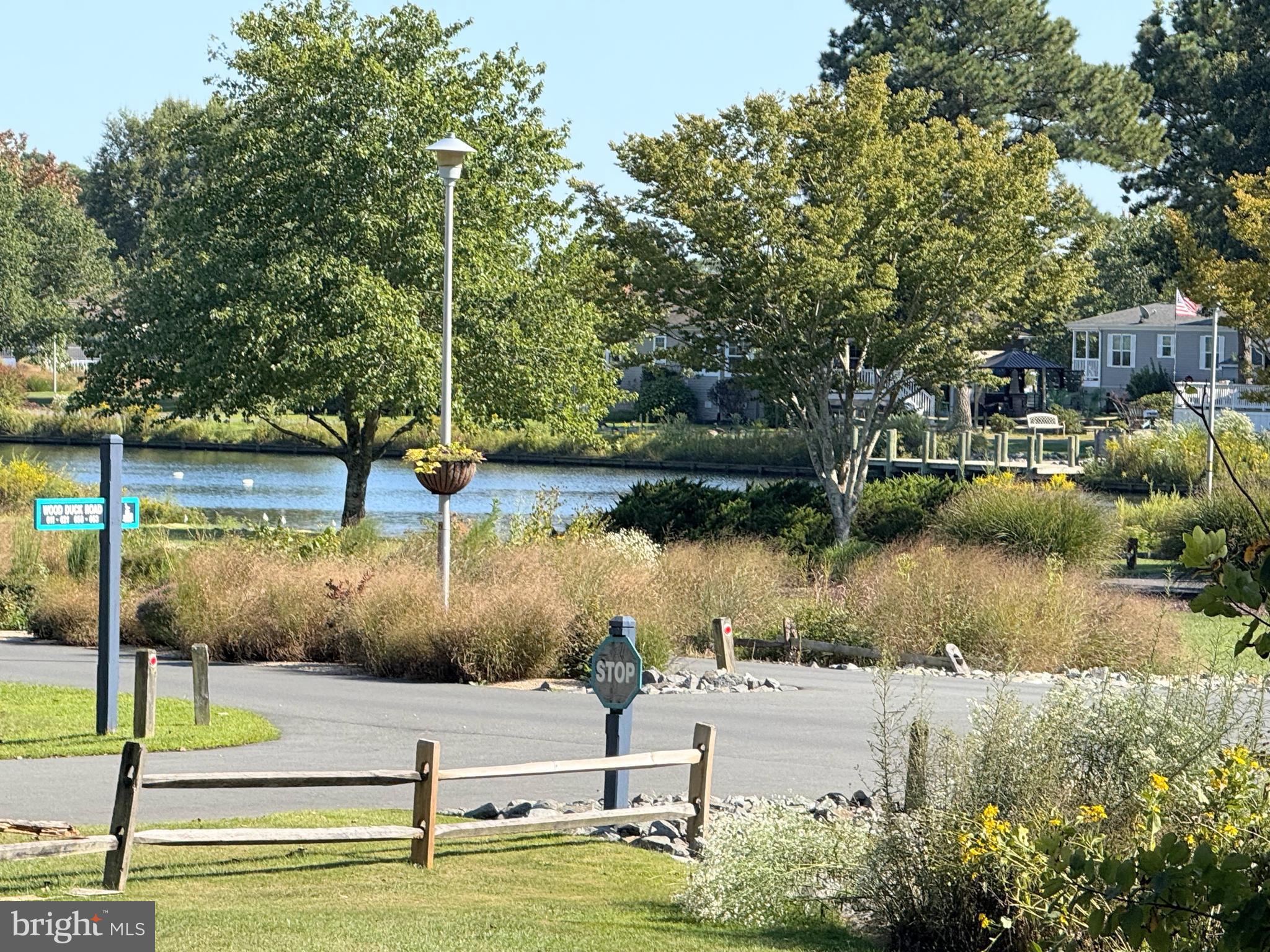 26908 Wood Duck Road, Unit 611 Long Neck, DE 19966 - Photo 15 of 80 a view of lake
