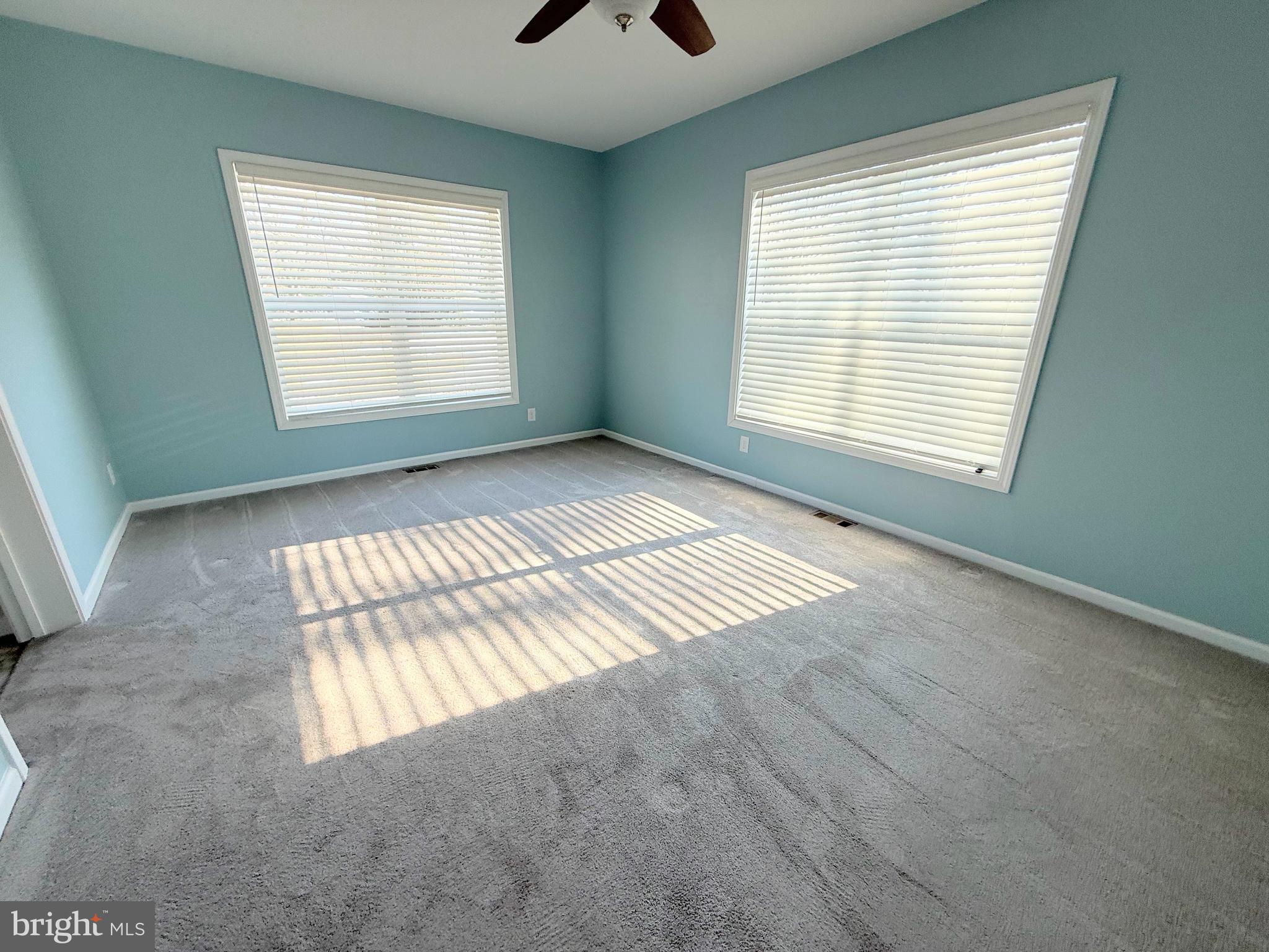 26908 Wood Duck Road, Unit 611 Long Neck, DE 19966 - Photo 41 of 80 a view of an empty room with a window