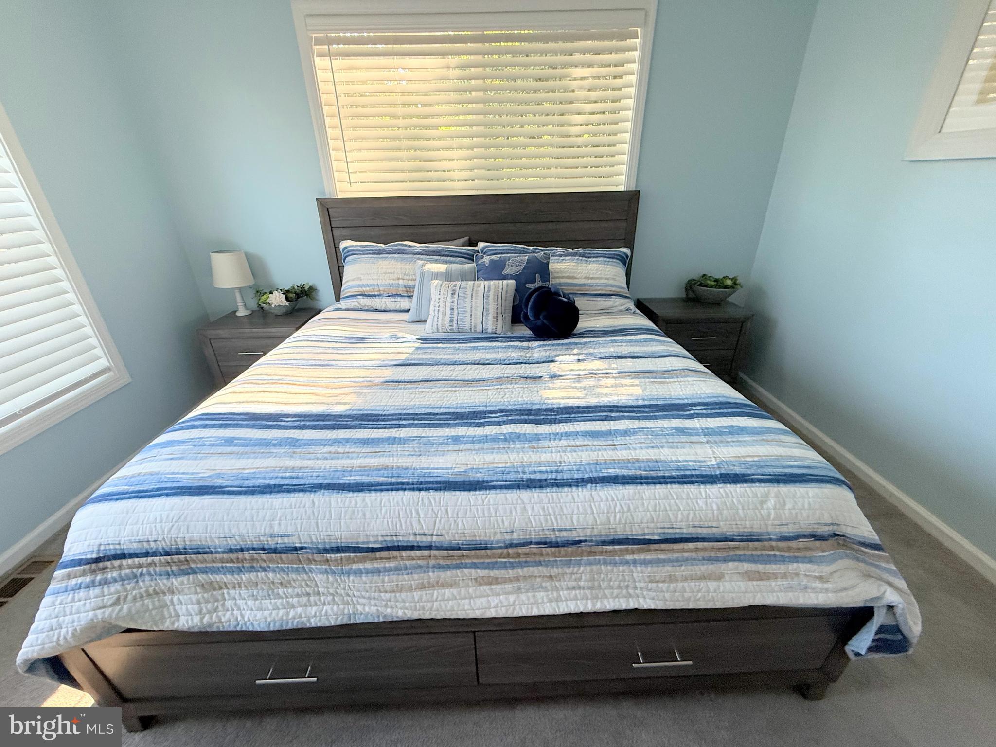 26908 Wood Duck Road, Unit 611 Long Neck, DE 19966 - Photo 57 of 80 a view of bedroom with a window