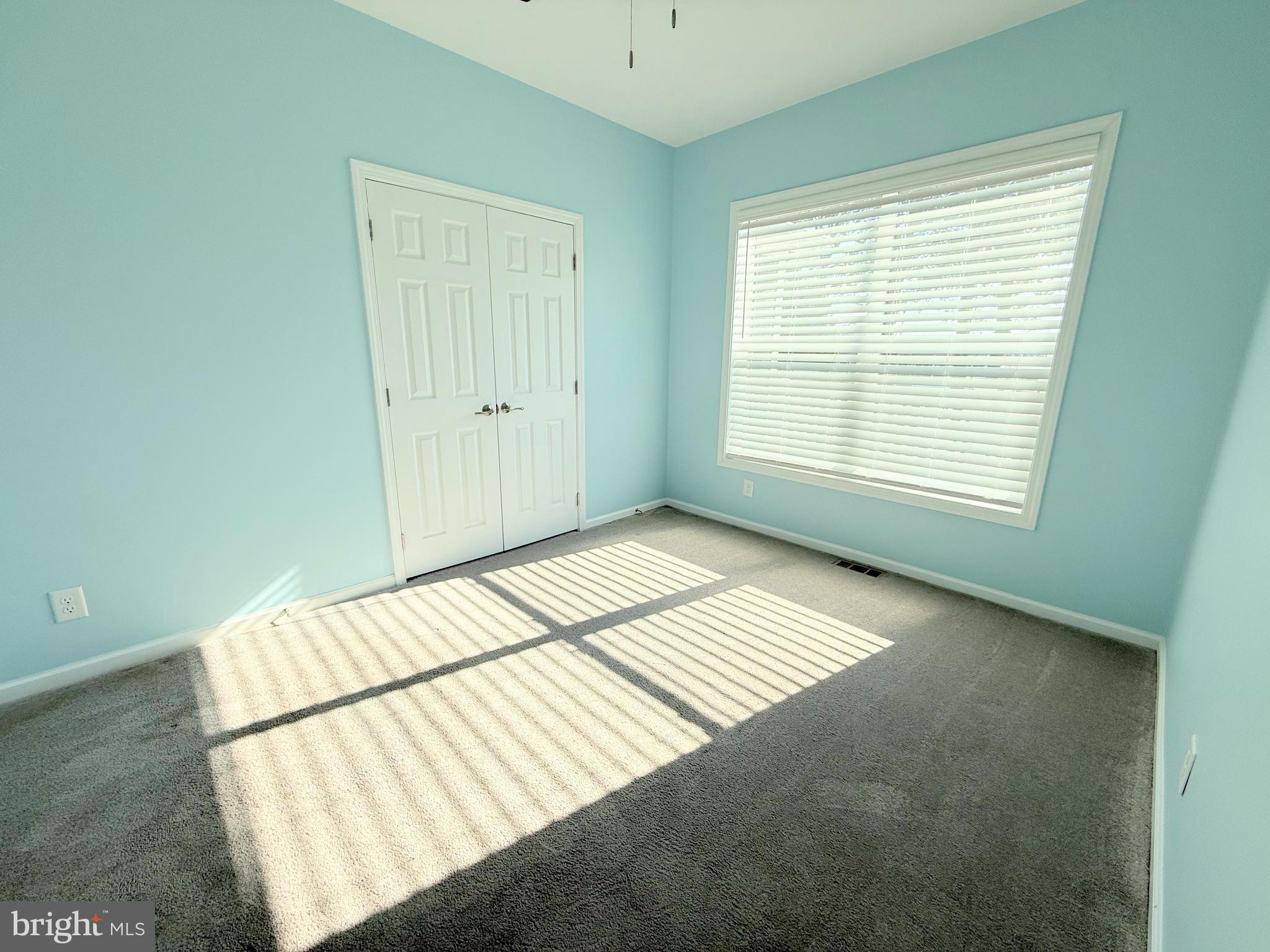 26908 Wood Duck Road, Unit 611 Long Neck, DE 19966 - Photo 59 of 80 a view of an empty room and window