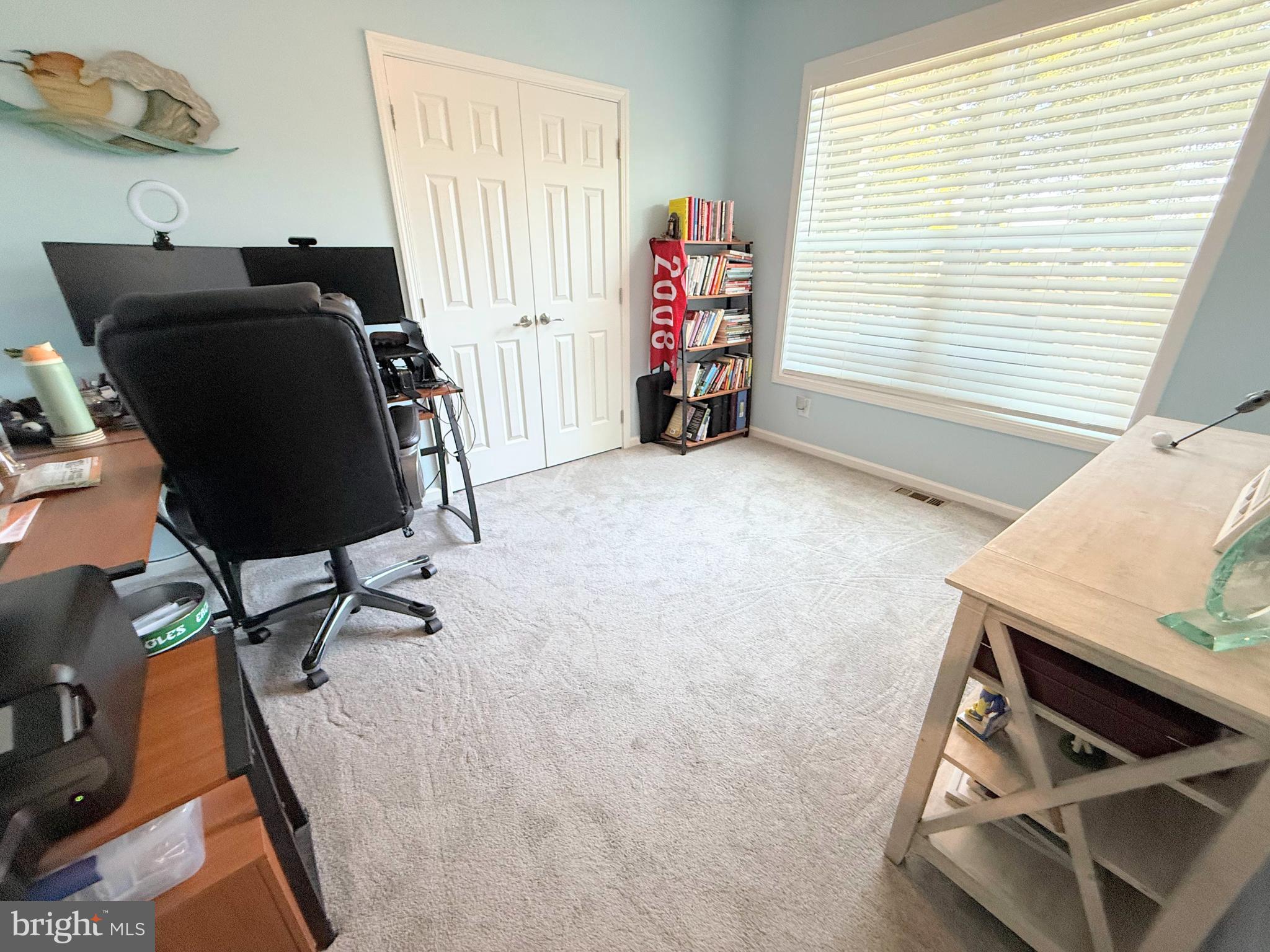 26908 Wood Duck Road, Unit 611 Long Neck, DE 19966 - Photo 60 of 80 a view of workspace with furniture and a window