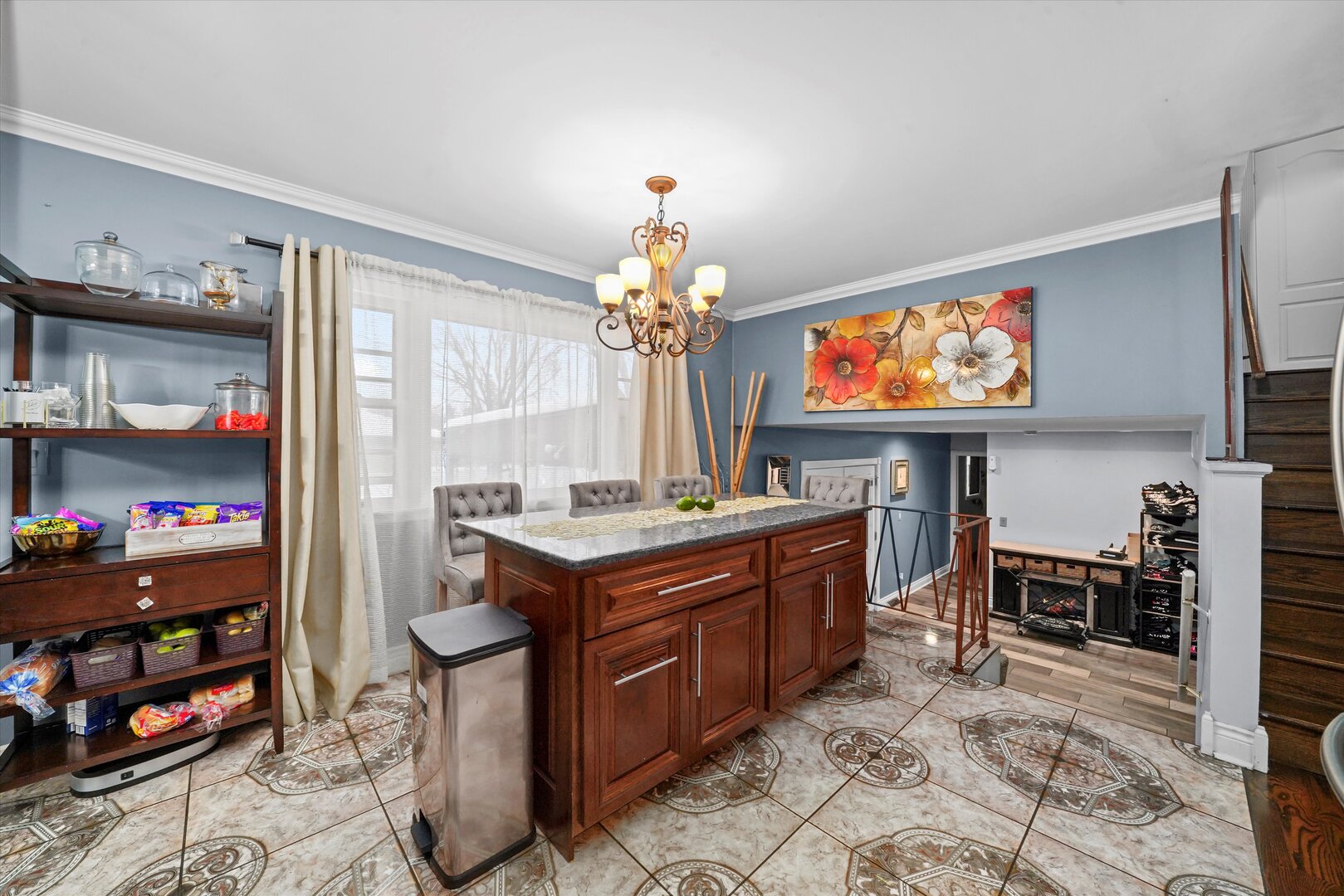 17702 Bernadine Street Lansing, IL 60438 - Photo 18 of 41 a kitchen that has a lot of cabinets and stainless steel appliances
