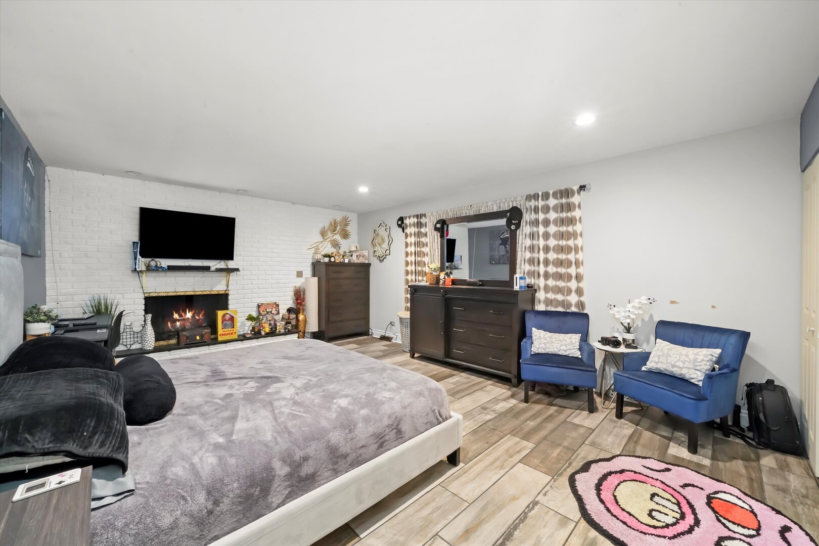 17702 Bernadine Street Lansing, IL 60438 - Photo 33 of 41 a bedroom with furniture and a flat screen tv