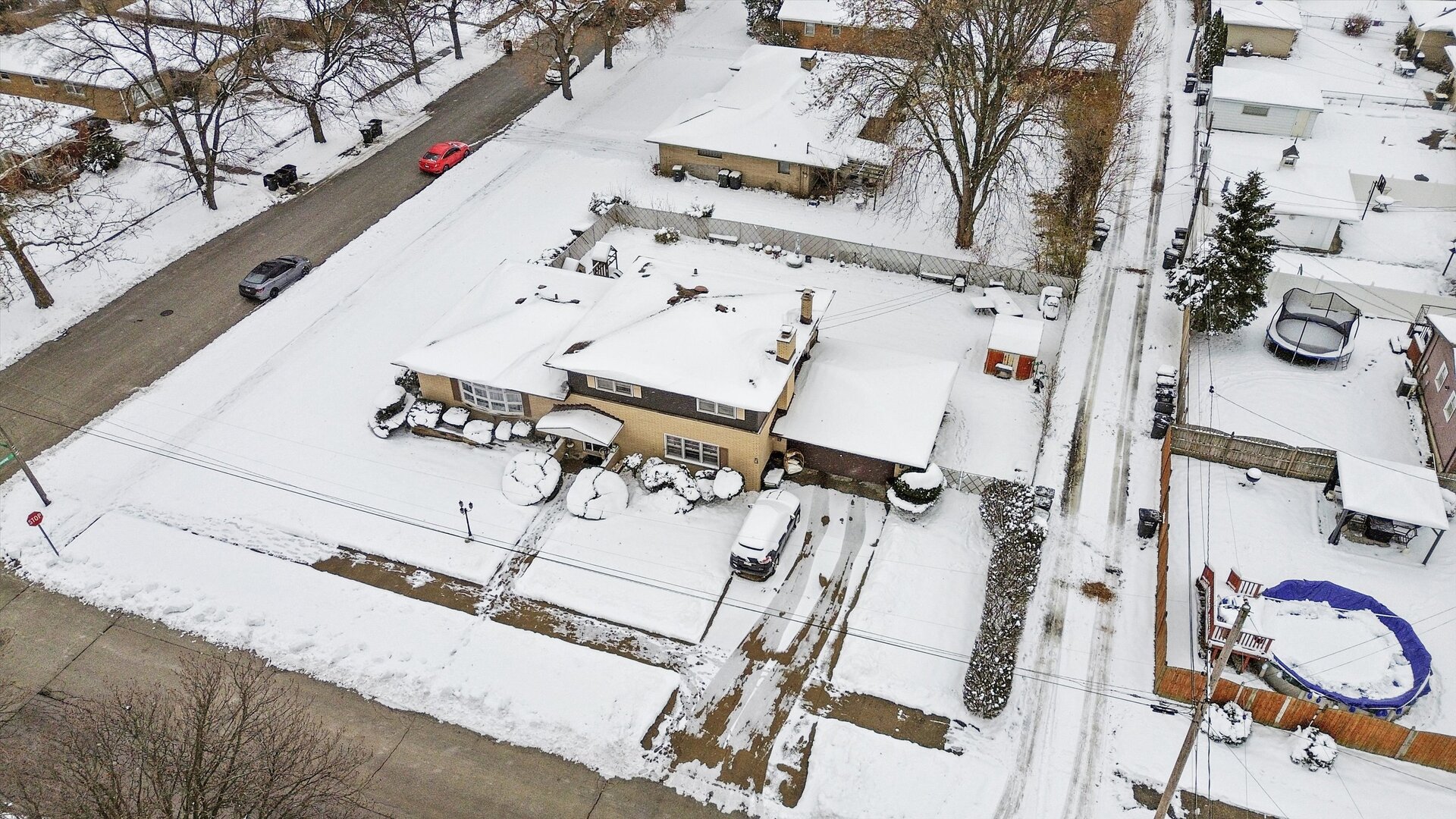 17702 Bernadine Street Lansing, IL 60438 - Photo 8 of 41 an aerial view of a white house with table and chairs