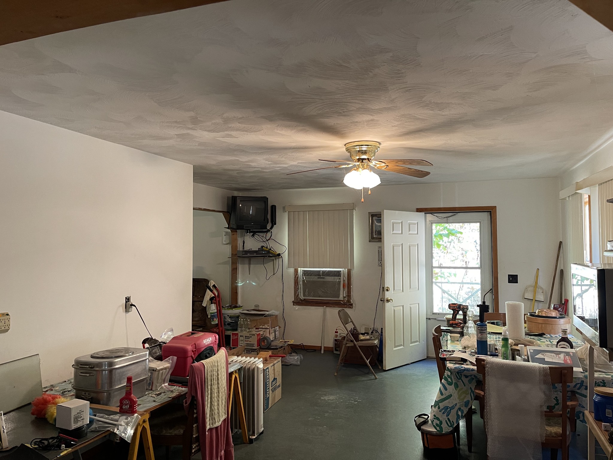 2217 Lemont And Yates Mountain Road Spencer, TN 38585 - Photo 23 of 36 a view of a livingroom with furniture and a ceiling fan