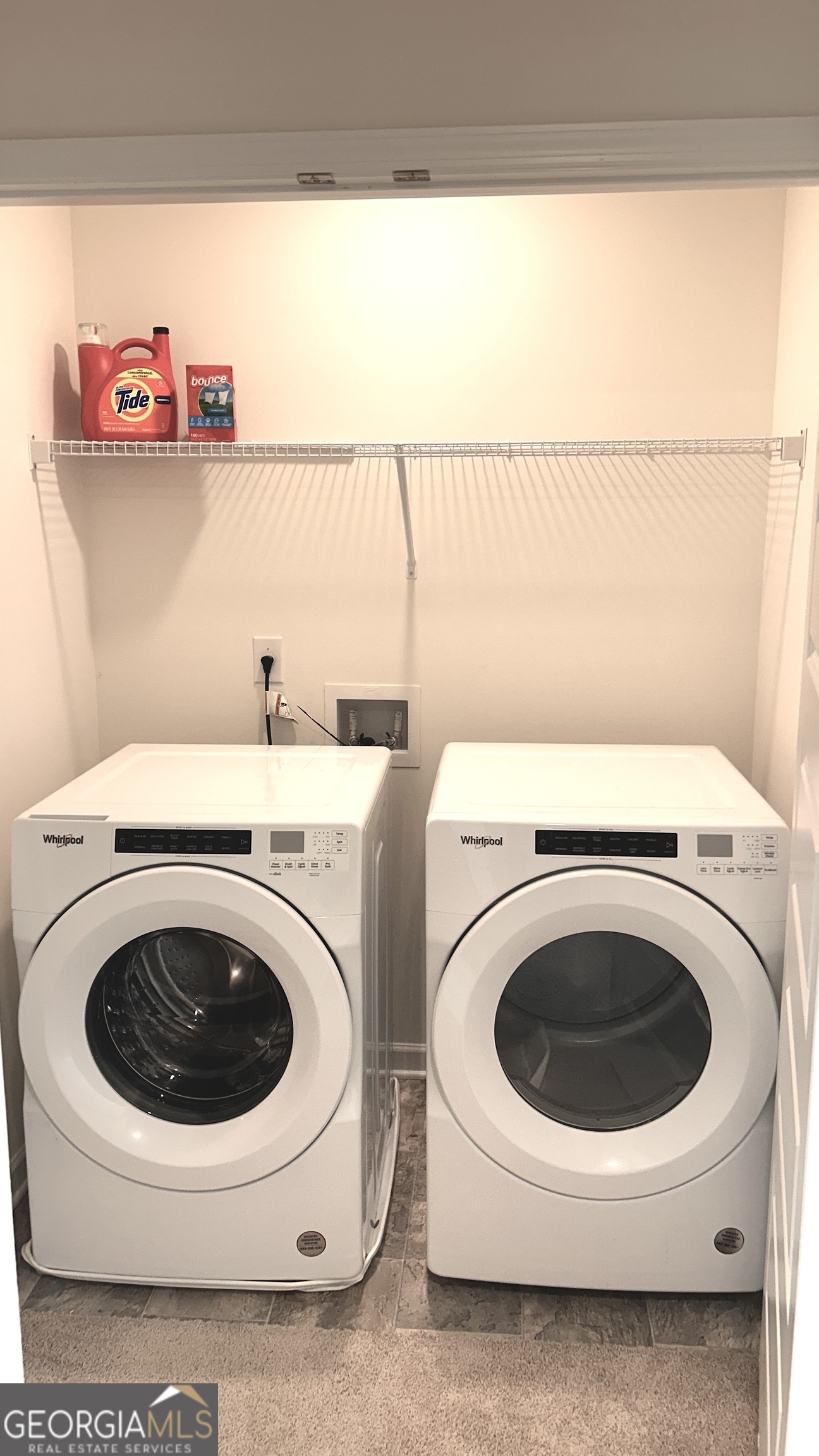 837 Taurus Drive Stockbridge, GA 30281 - Photo 16 of 20 a utility room with dryer and washer