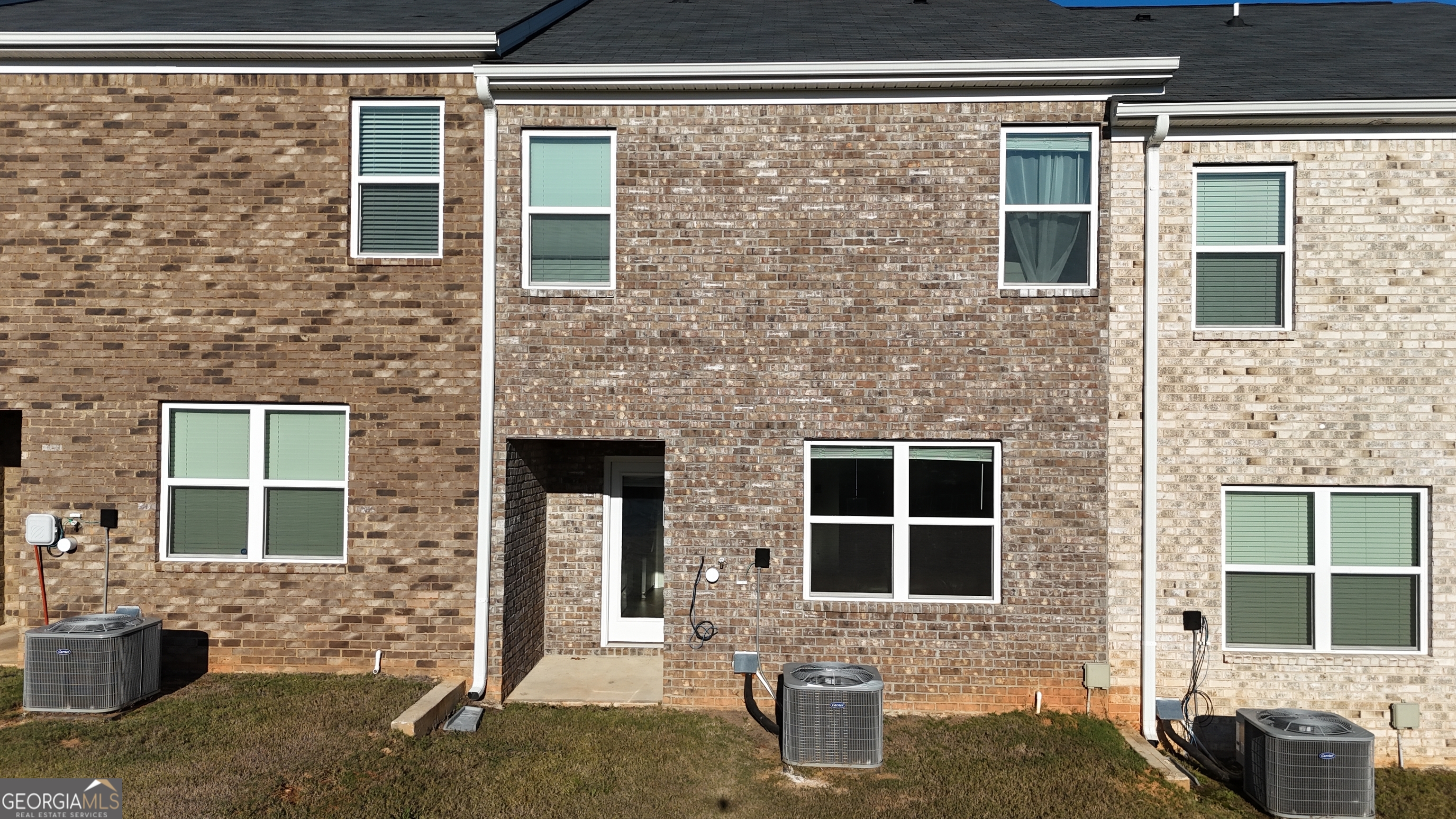 837 Taurus Drive Stockbridge, GA 30281 - Photo 17 of 20 a front view of a house with a yard