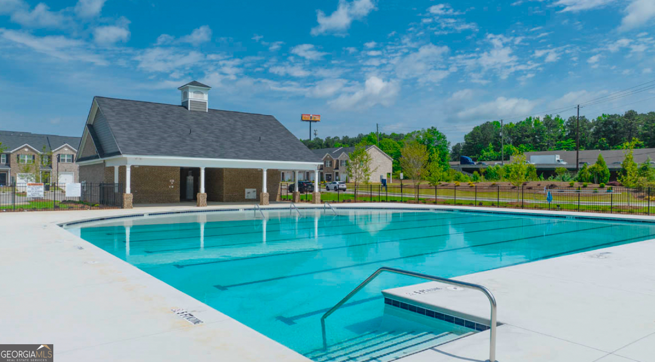 837 Taurus Drive Stockbridge, GA 30281 - Photo 20 of 20 a view of an house with a swimming pool