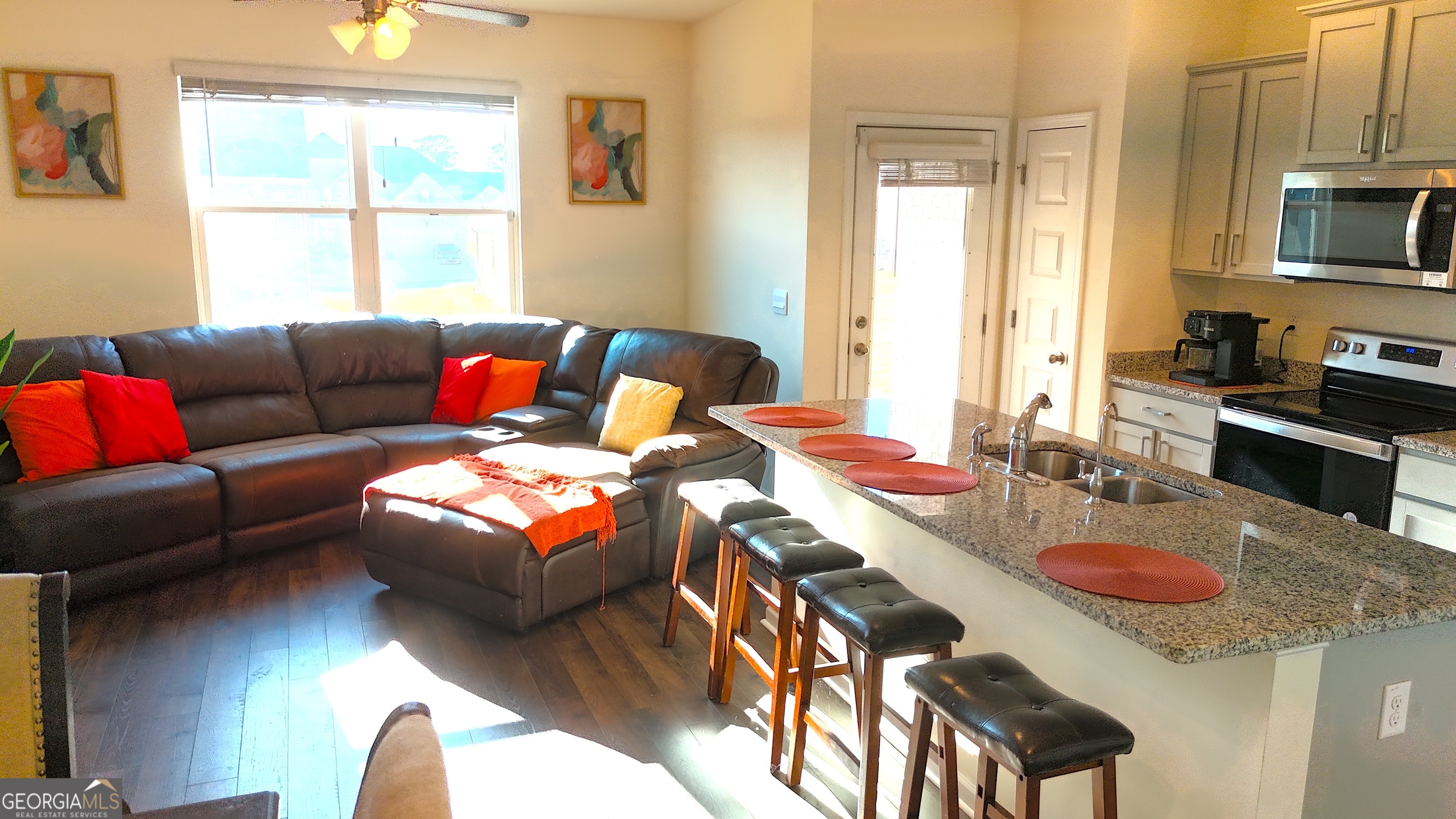 837 Taurus Drive Stockbridge, GA 30281 - Photo 3 of 20 a living room with furniture and a flat screen tv