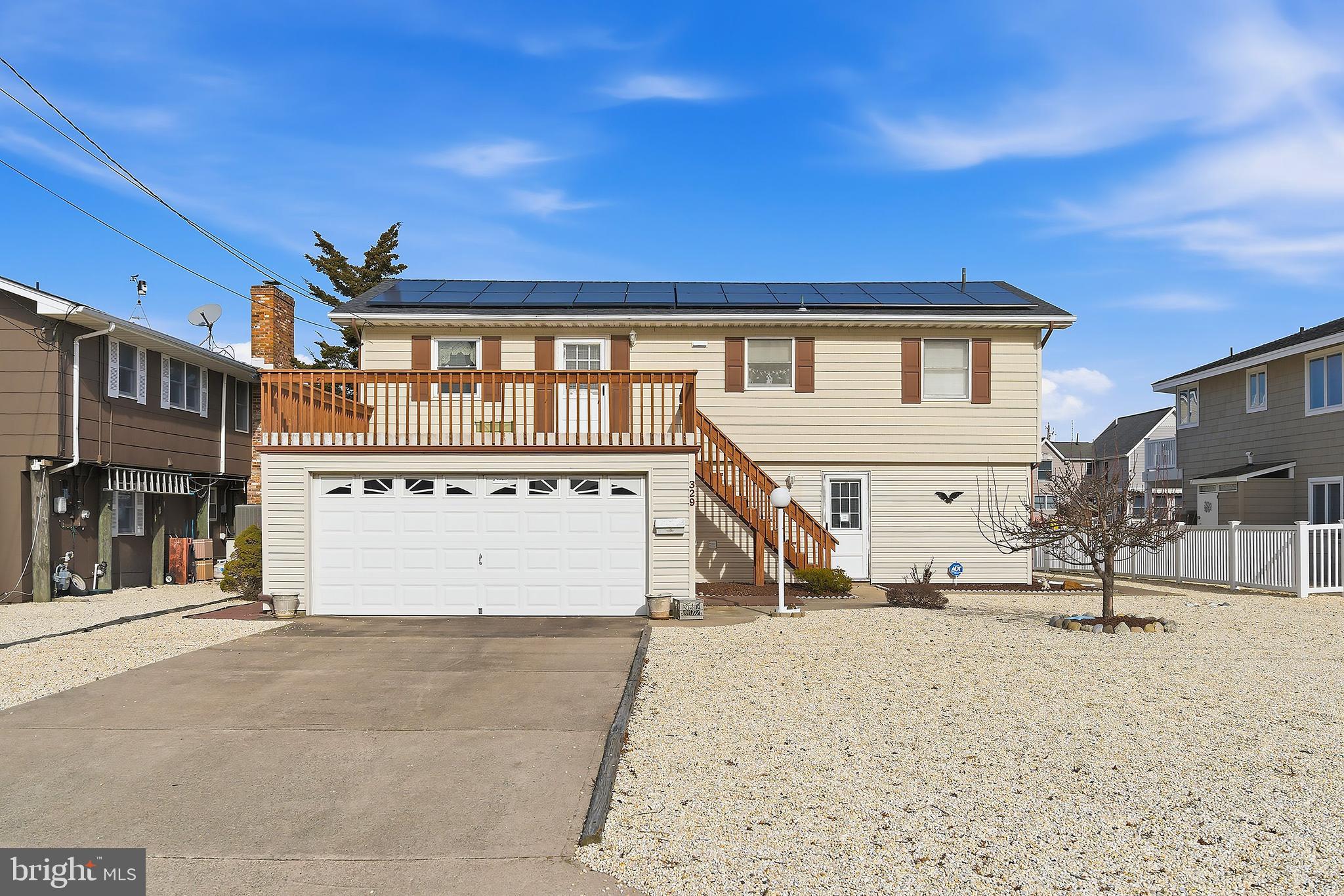 329 West 5th Street Ship Bottom, NJ 08008 - Photo 1 of 47 a view of a building with a outdoor space
