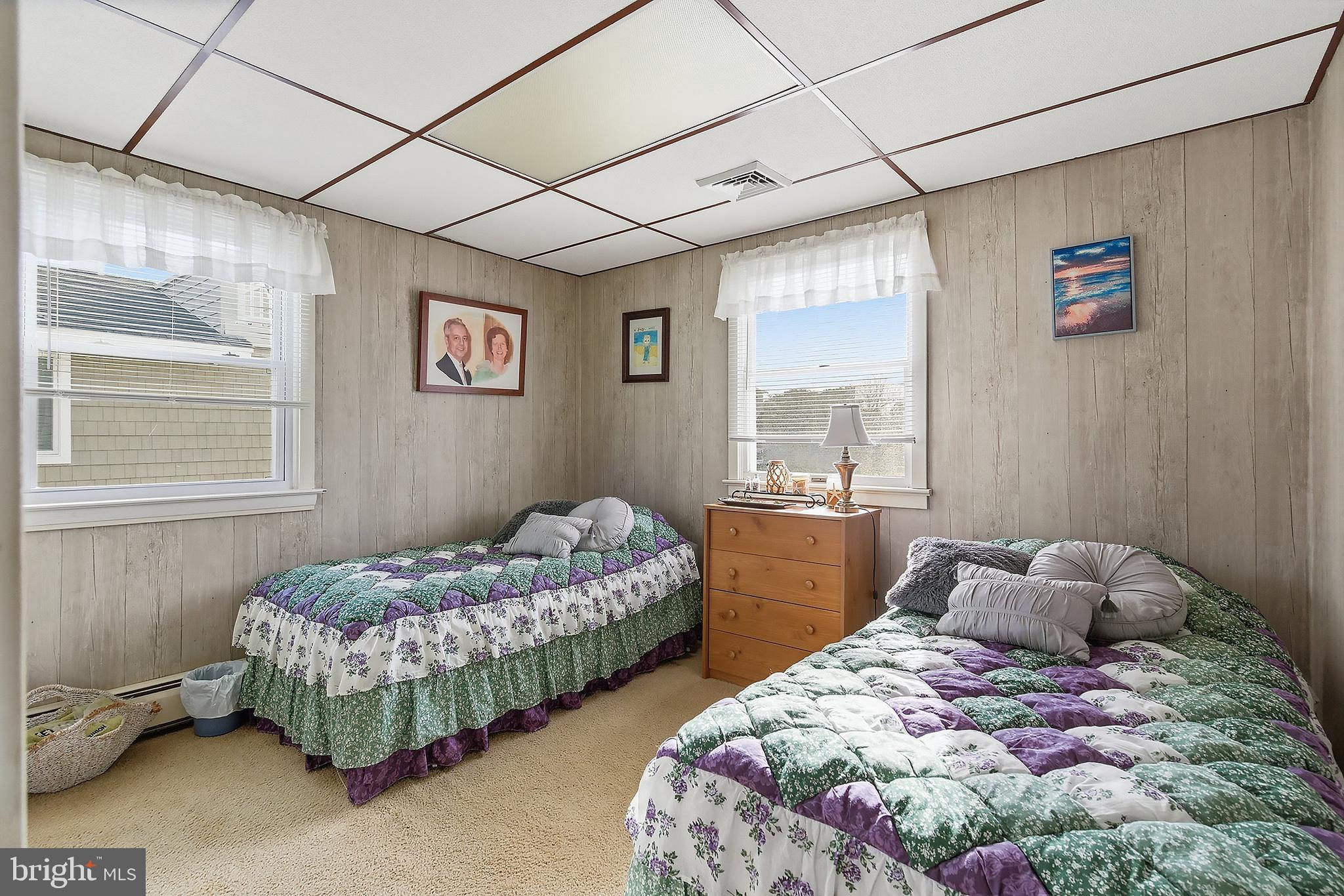 329 West 5th Street Ship Bottom, NJ 08008 - Photo 17 of 47 a bedroom with two beds and painted walls