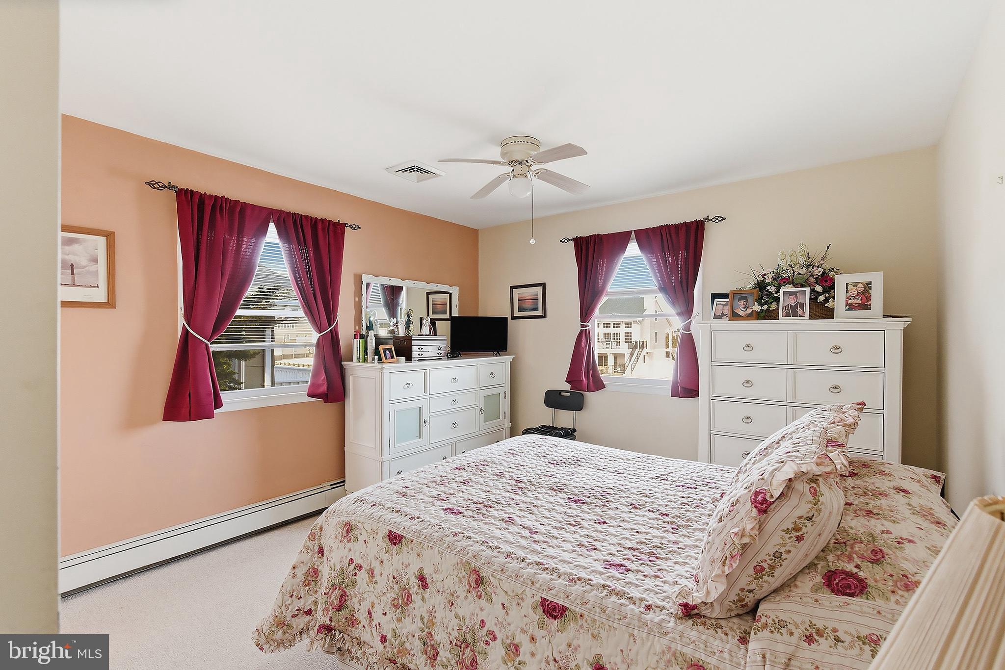 329 West 5th Street Ship Bottom, NJ 08008 - Photo 23 of 47 a bed room with a bed and a window