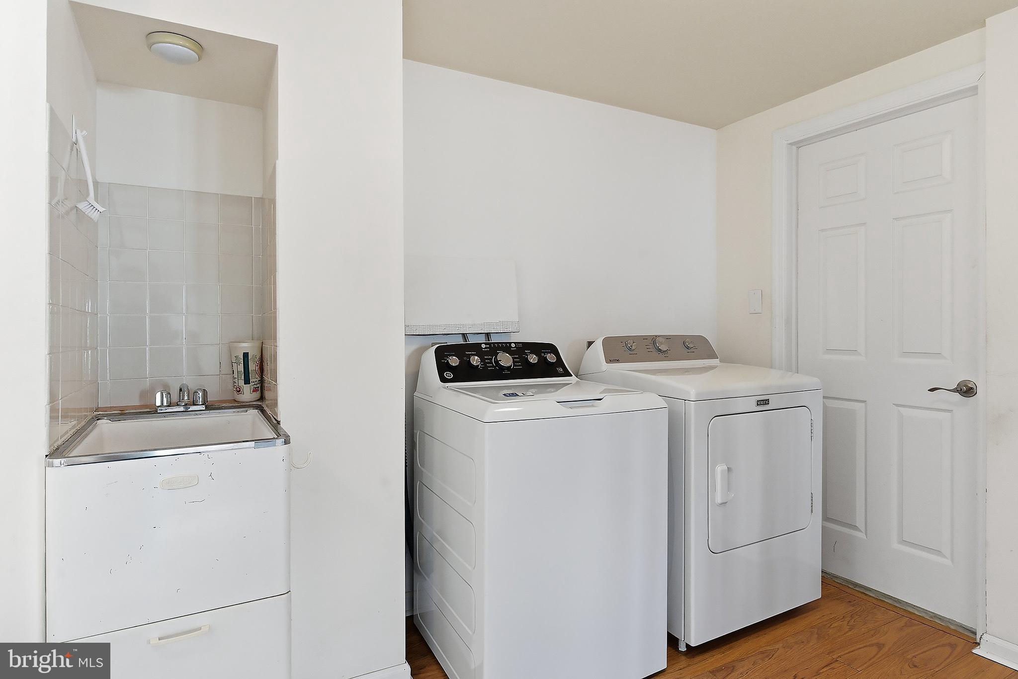 329 West 5th Street Ship Bottom, NJ 08008 - Photo 31 of 47 a utility room with dryer and washer