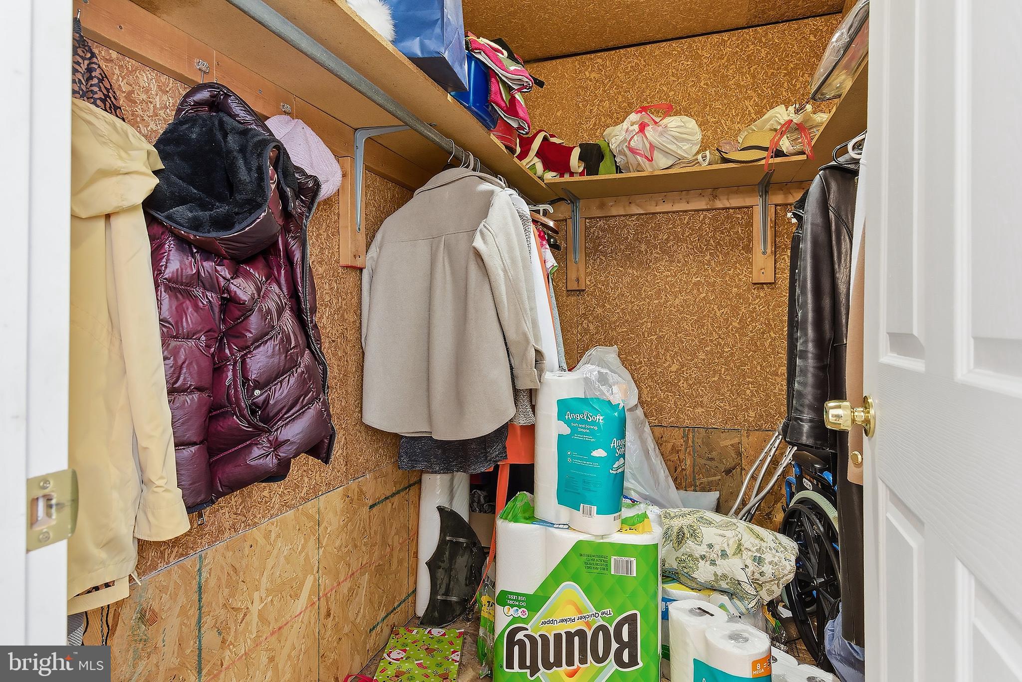 329 West 5th Street Ship Bottom, NJ 08008 - Photo 32 of 47 a view of walk in closet with clothes and shoes