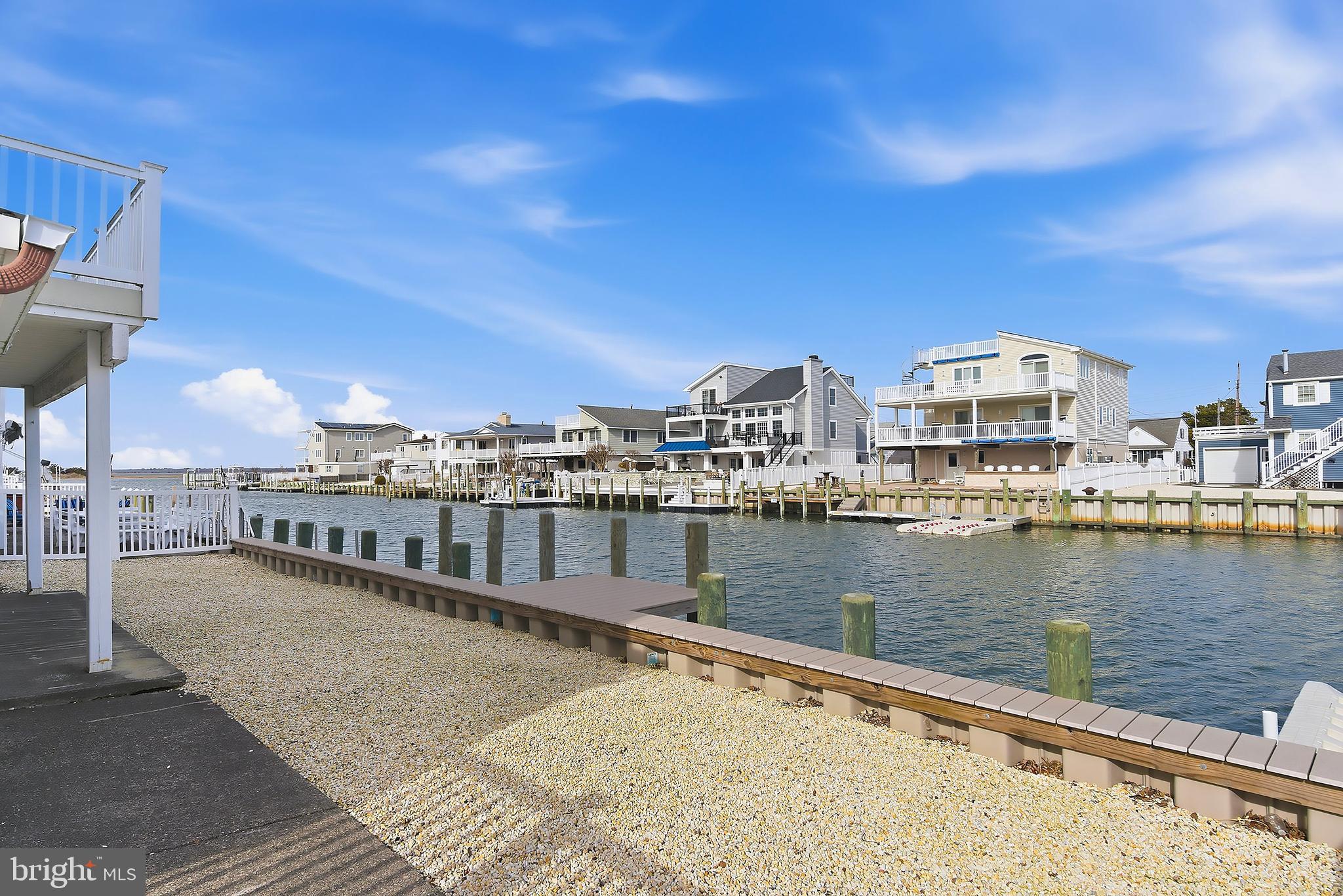 329 West 5th Street Ship Bottom, NJ 08008 - Photo 36 of 47 a view of a lake with a city