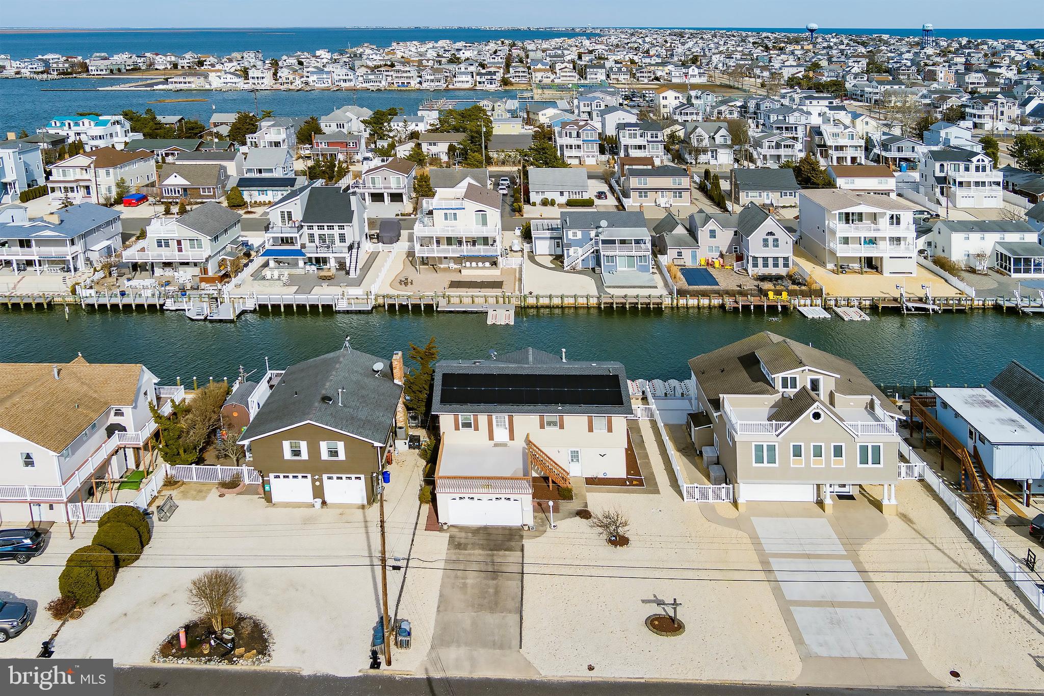 329 West 5th Street Ship Bottom, NJ 08008 - Photo 4 of 47 an aerial view of a house with a ocean view