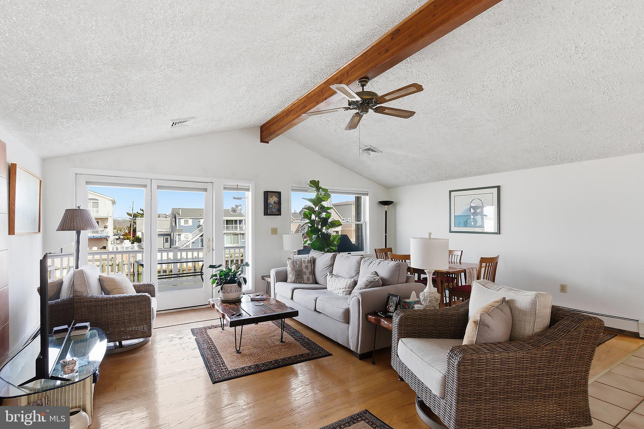 329 West 5th Street Ship Bottom, NJ 08008 - Photo 6 of 47 a living room with furniture