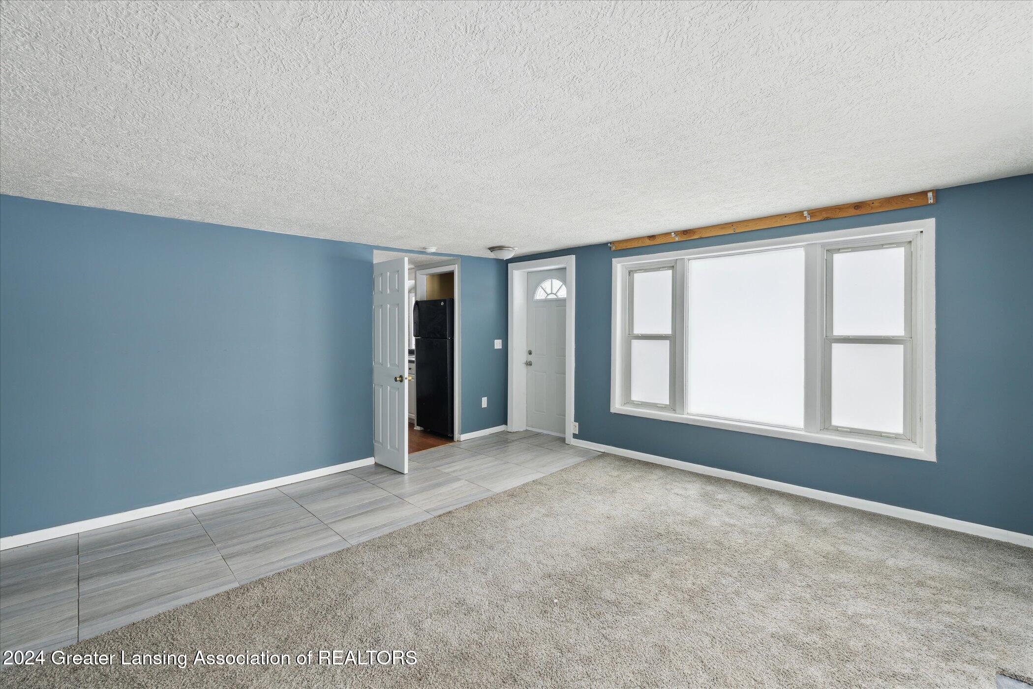 3016 West Miller Road Lansing, MI 48911 - Photo 6 of 32 09-3016-W-Miller-Rd-Lansing-MI-48911-Win