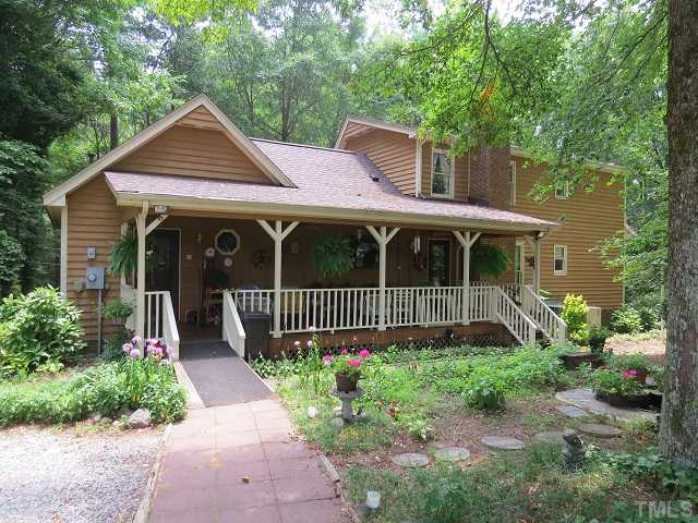 571 Lee Road, Unit B Clayton, NC 27520 - Photo 3 of 25 Enjoy your evenings on the back porch over looking the beautiful yard, with fish pond, bird houses, gazebo, pasture for horses/cows ect....