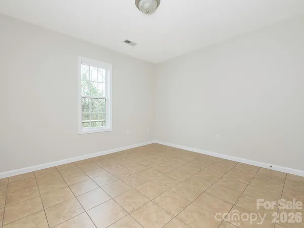 a bathroom with a sink a toilet and vanity