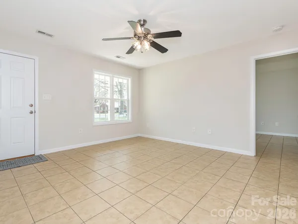 a view of a kitchen with a sink and cabinet area