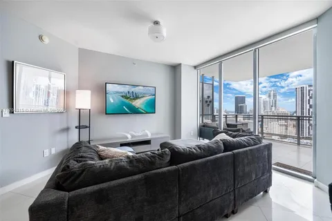 a living room with furniture and a couch