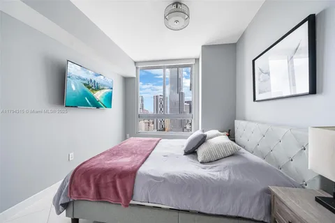 a view of a balcony and a yard