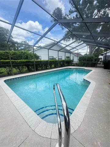 a utility room with a sink a washer and dryer