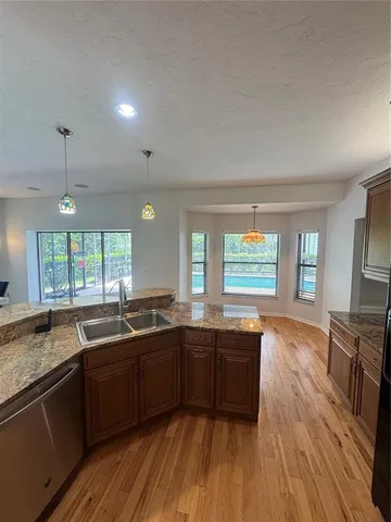 a kitchen with lots of counter space and a sink